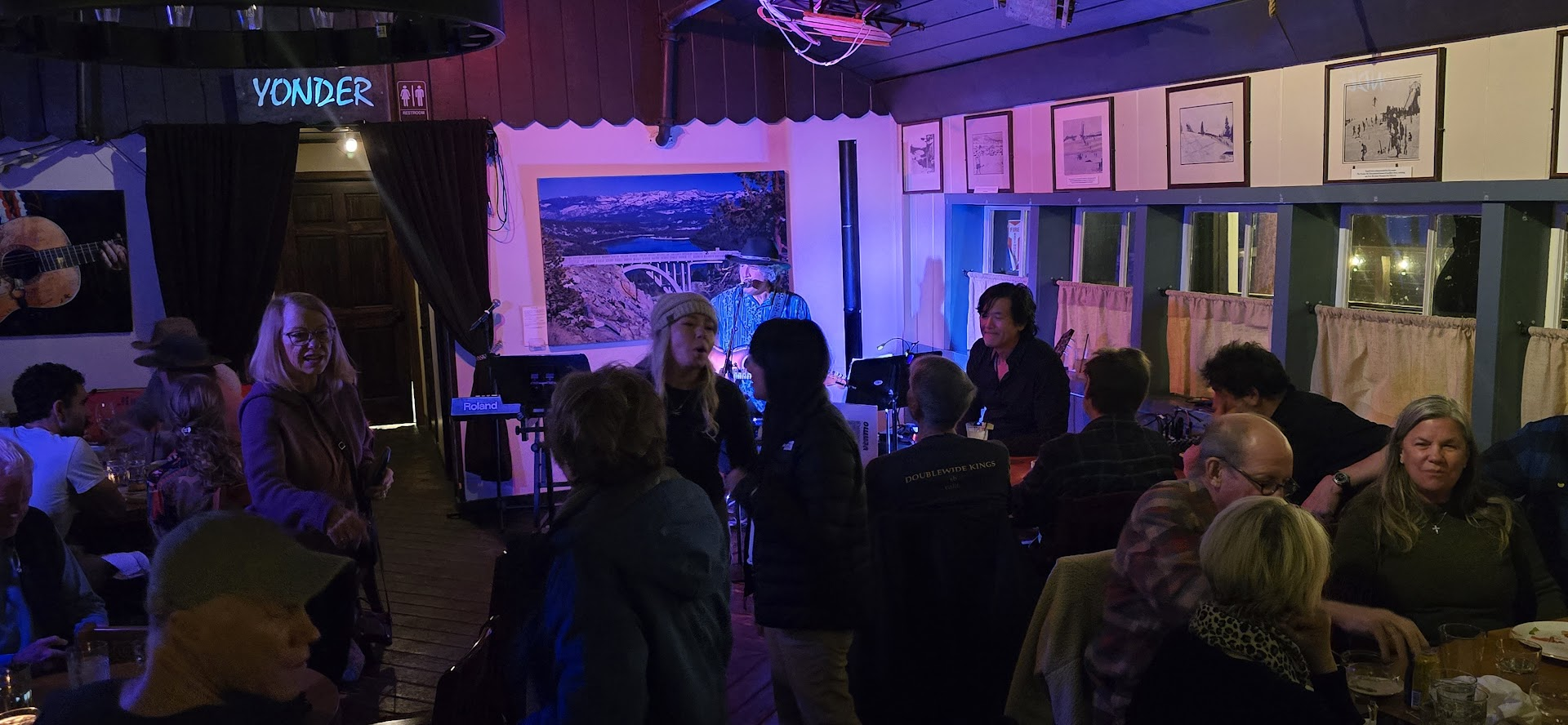 Crowd mingling at Open Mic night at Yonder restaurant in Truckee